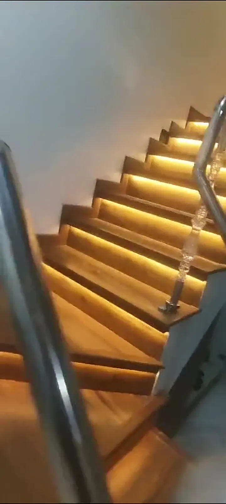 Wood-finished staircase walkthrough video